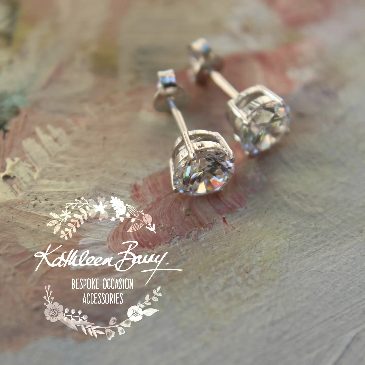 Cubic Zirconia studs - Sterling silver - Sizes range from 9mm to 5mm stones (limited stock)